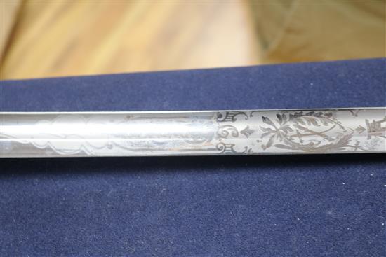 A 19th century silver and shagreen oriental sword and a 19th century dress sword longest 101cm